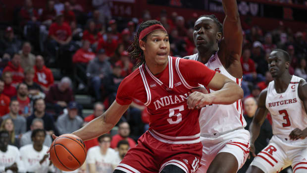 Indiana Hoosiers forward Malik Reneau (5) drives to the basket against Rutgers Scarlet Knights center Clifford Omoruyi (11) during the first half at Jersey Mike's Arena.